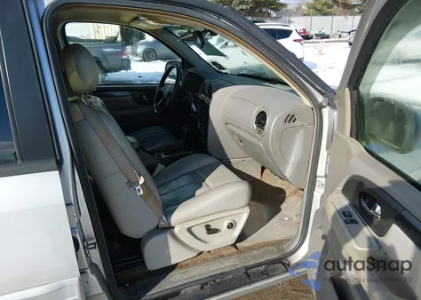 2005 GMC Envoy Sle z USA, uszkodzony, nr VIN 1GKDS13S052385705